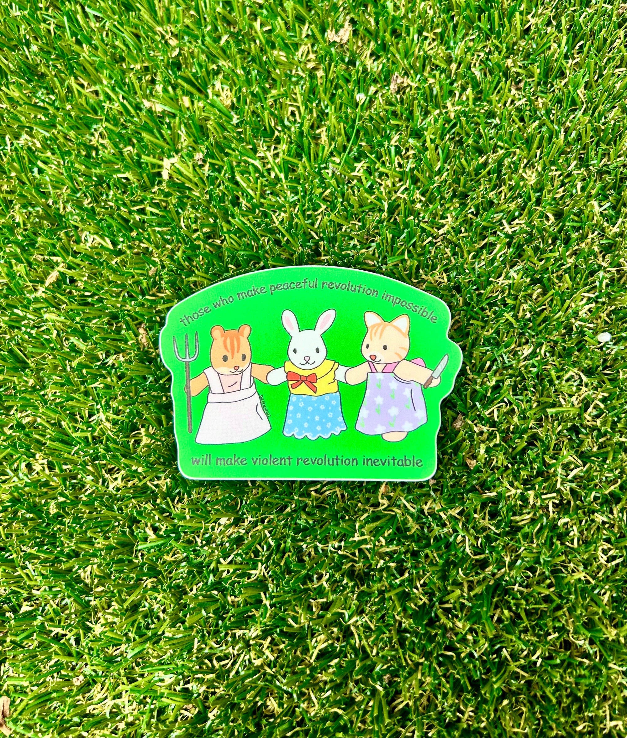 Colorful magnet with cartoon characters on a grass background