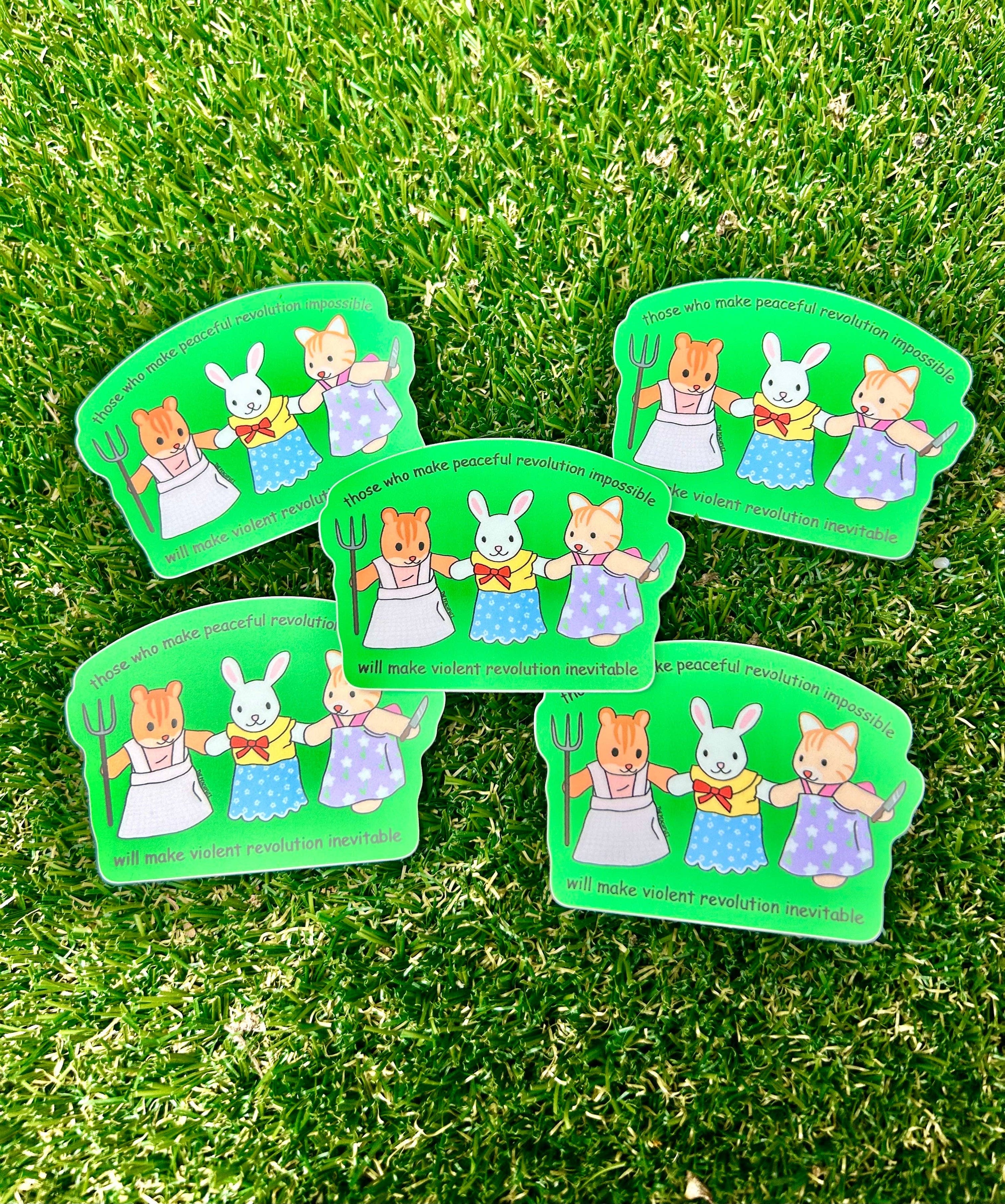 Set of four green stickers with cartoon characters on a grass background