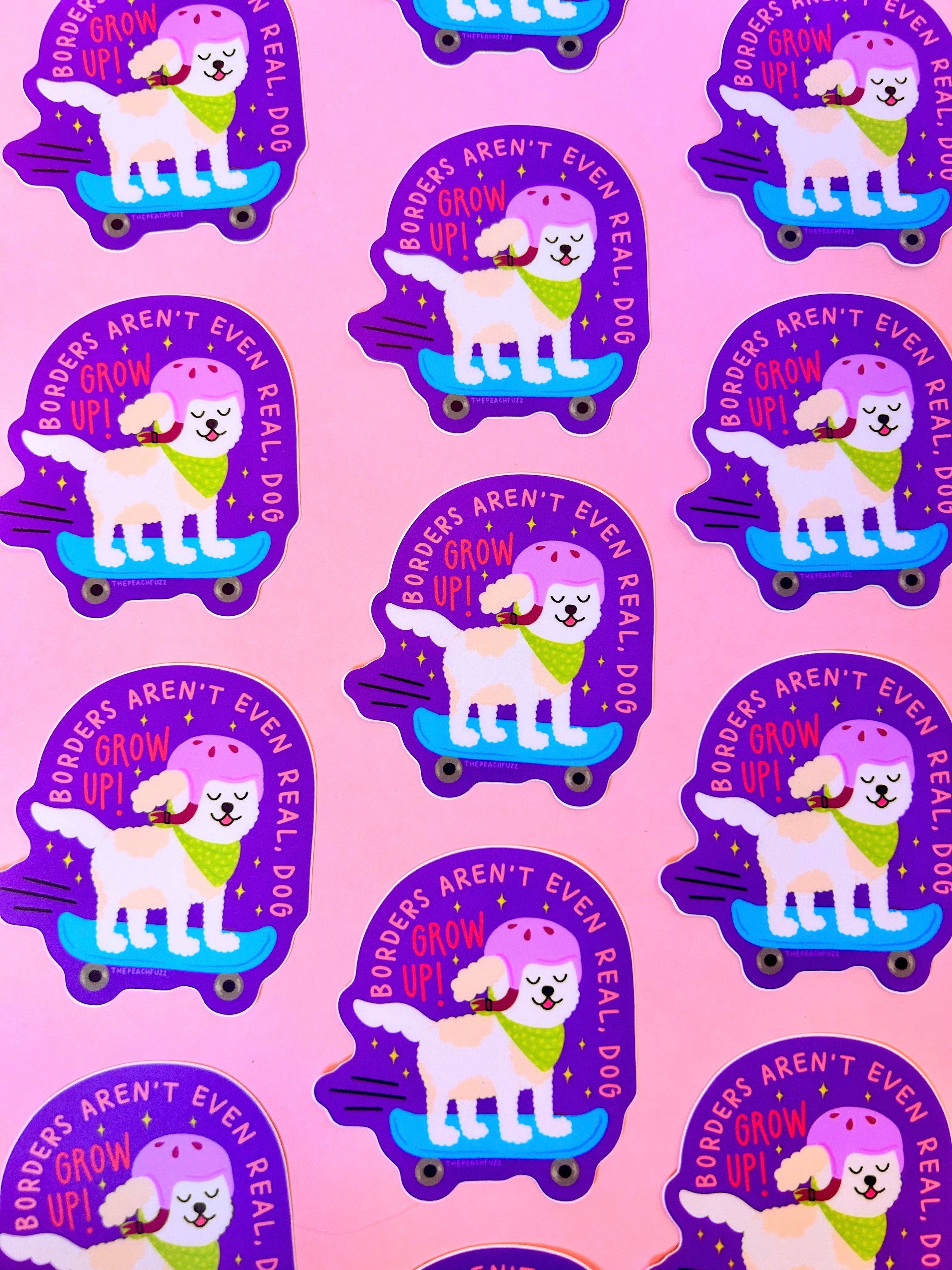 Pattern of cartoon dogs on skateboards with text on a pink background borders aren't even real dog grow up