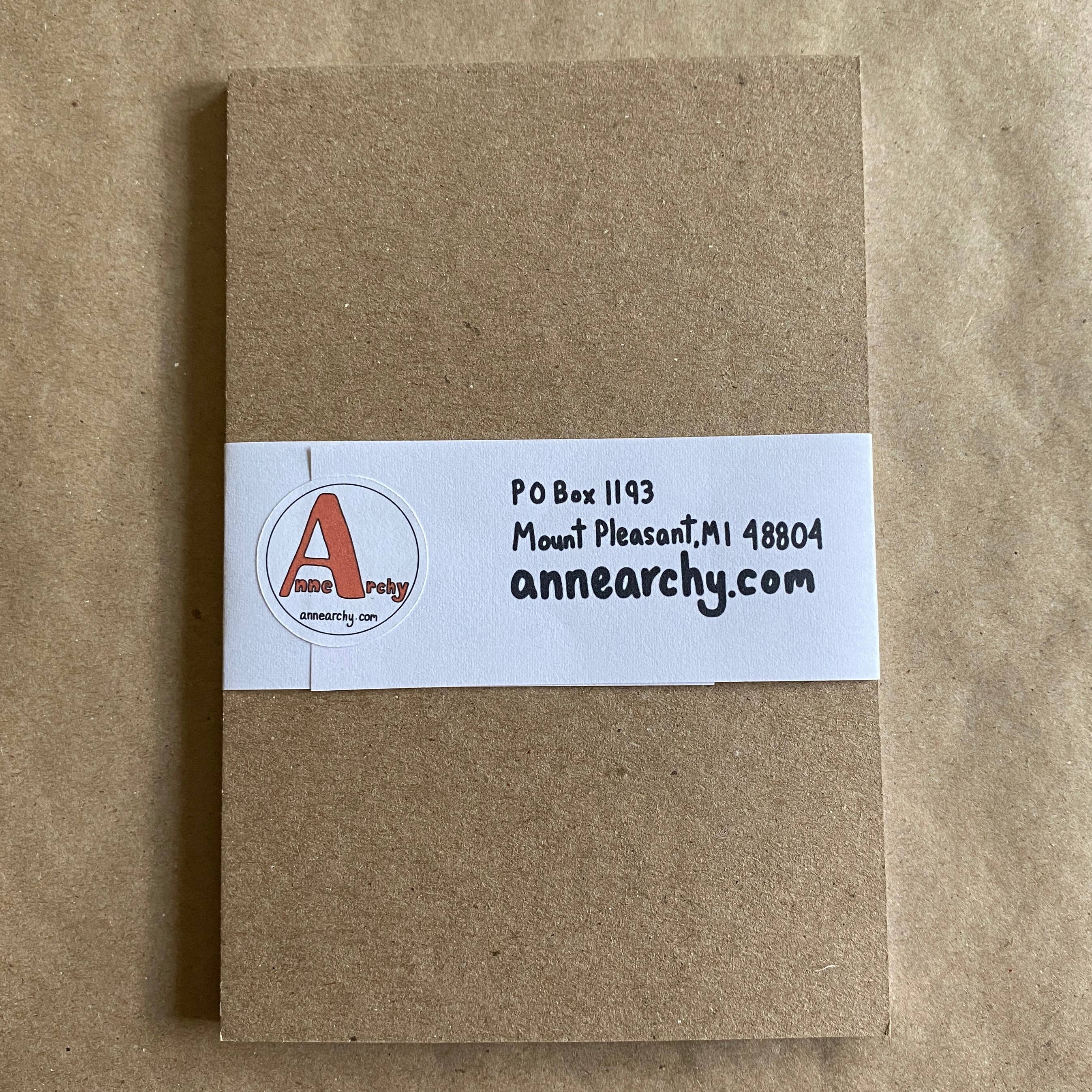 Kraft paper package with a label on a brown background