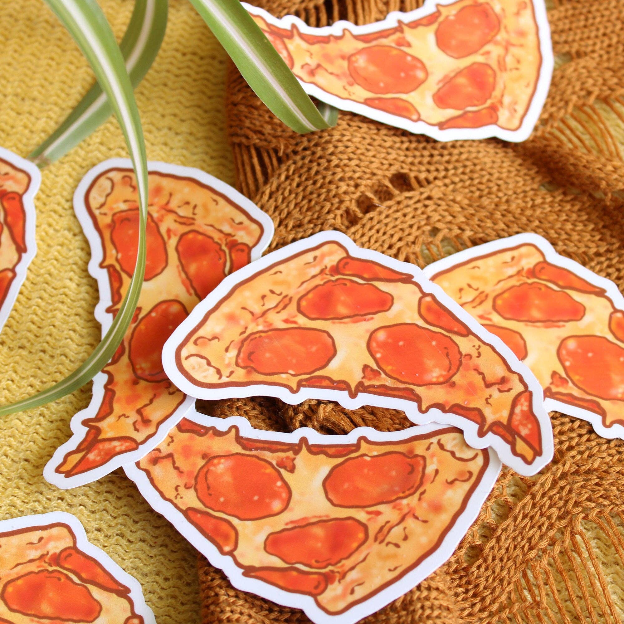 Pepperoni pizza slices on a textured fabric background
